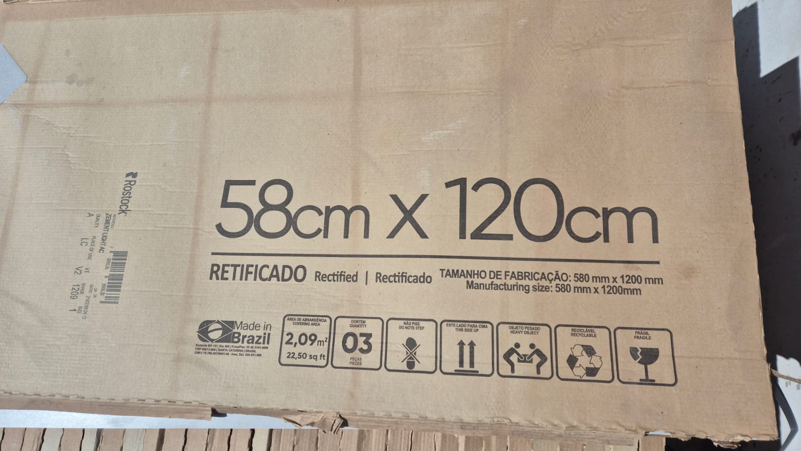 Porcelanicos gris de 58 x 120 cm. En cajas cerradas. Total 66 m2